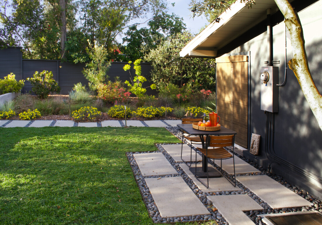 Modern concrete patio installation in Colton, CA backyard